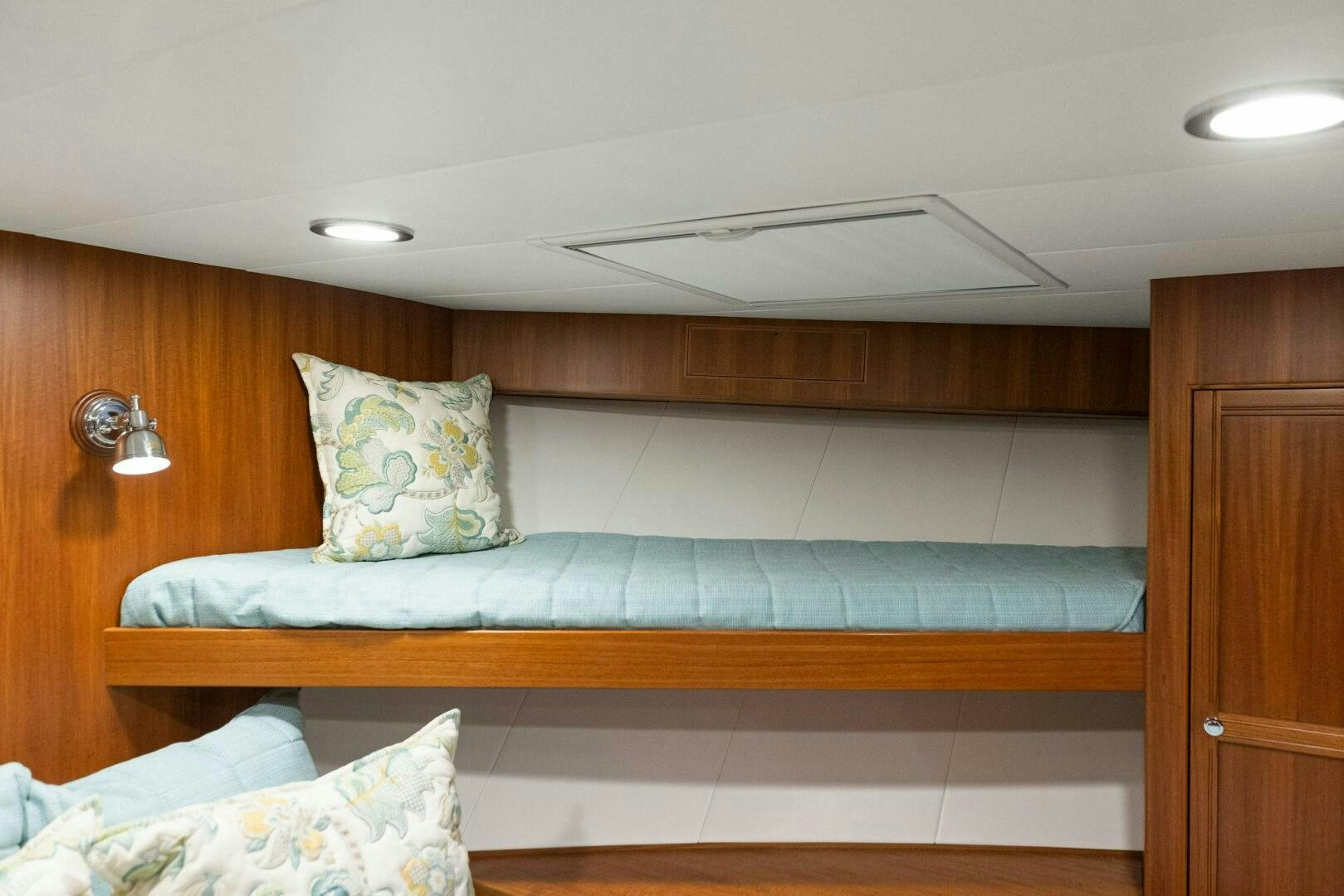 a bed with pillows aboard SUNZSET Yacht for Sale