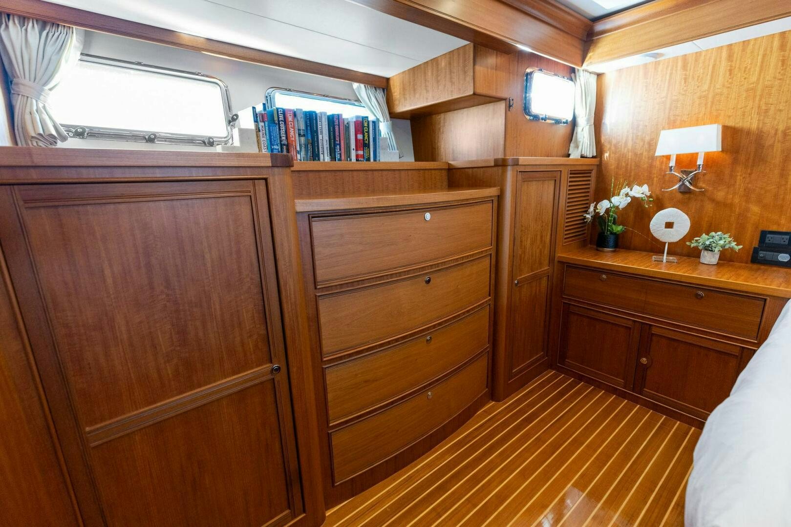 a wooden cabinet in a room aboard SUNZSET Yacht for Sale