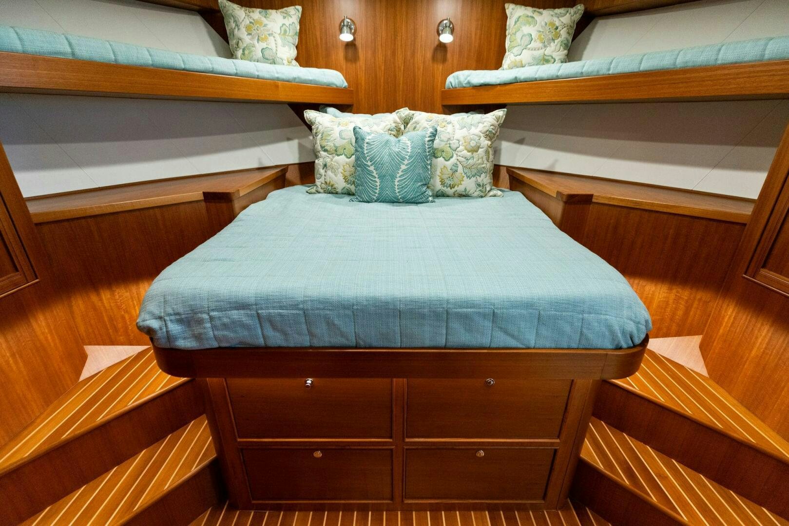 a bed with pillows aboard SUNZSET Yacht for Sale