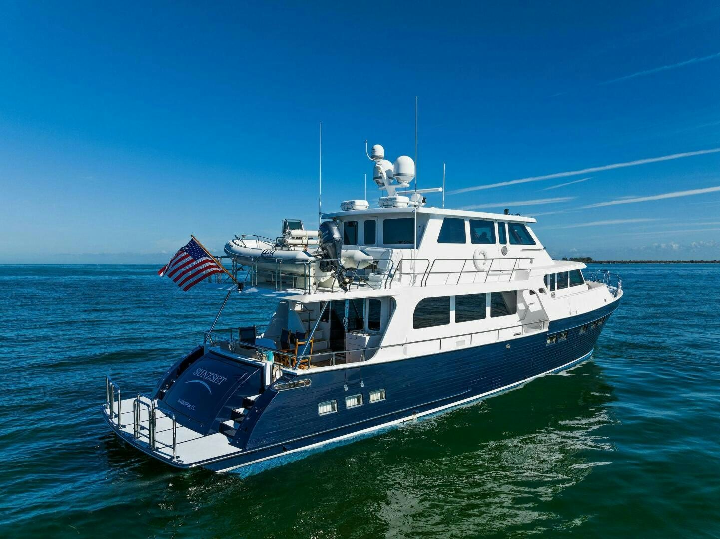 a boat on the water aboard SUNZSET Yacht for Sale