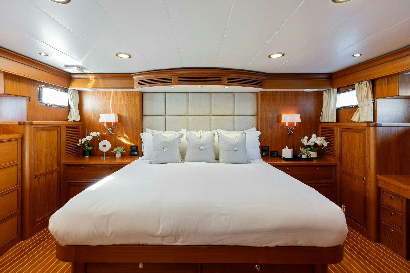a large bed in a room aboard SUNZSET Yacht for Sale