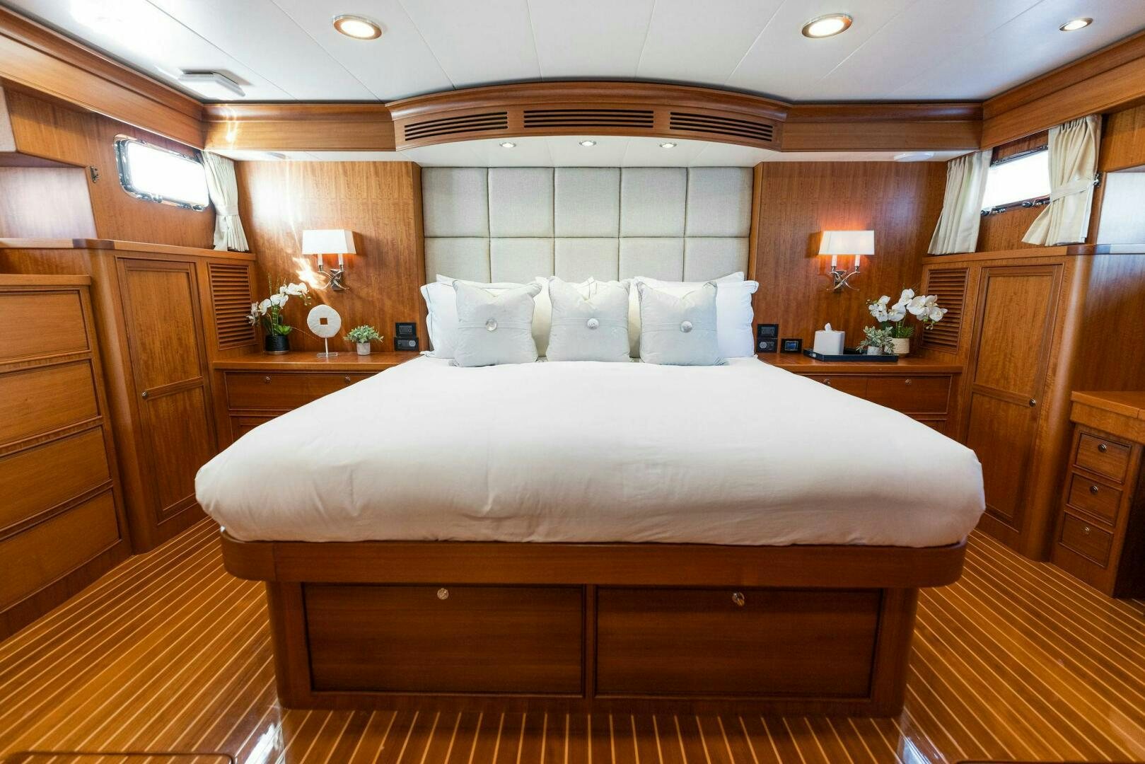 a large bed in a room aboard SUNZSET Yacht for Sale