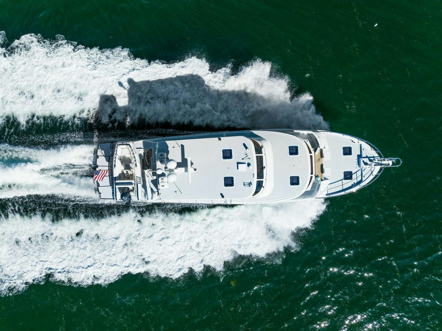 a helicopter in the ocean aboard SUNZSET Yacht for Sale