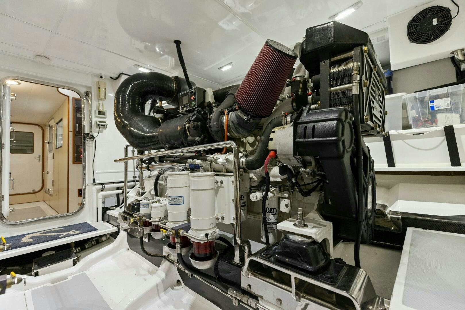 a machine with a red and black object on the side aboard SUNZSET Yacht for Sale