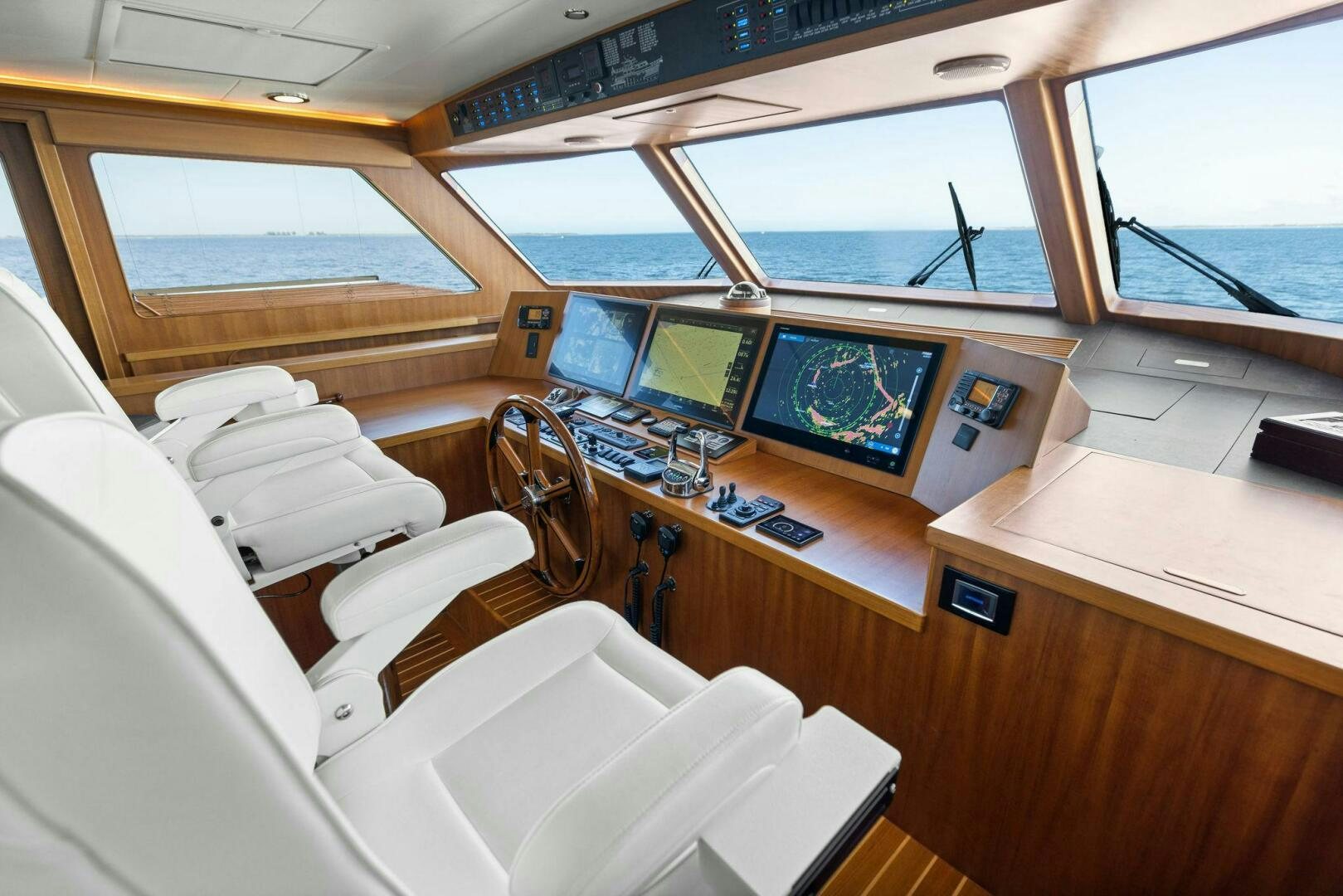 a room with a desk and a computer aboard SUNZSET Yacht for Sale