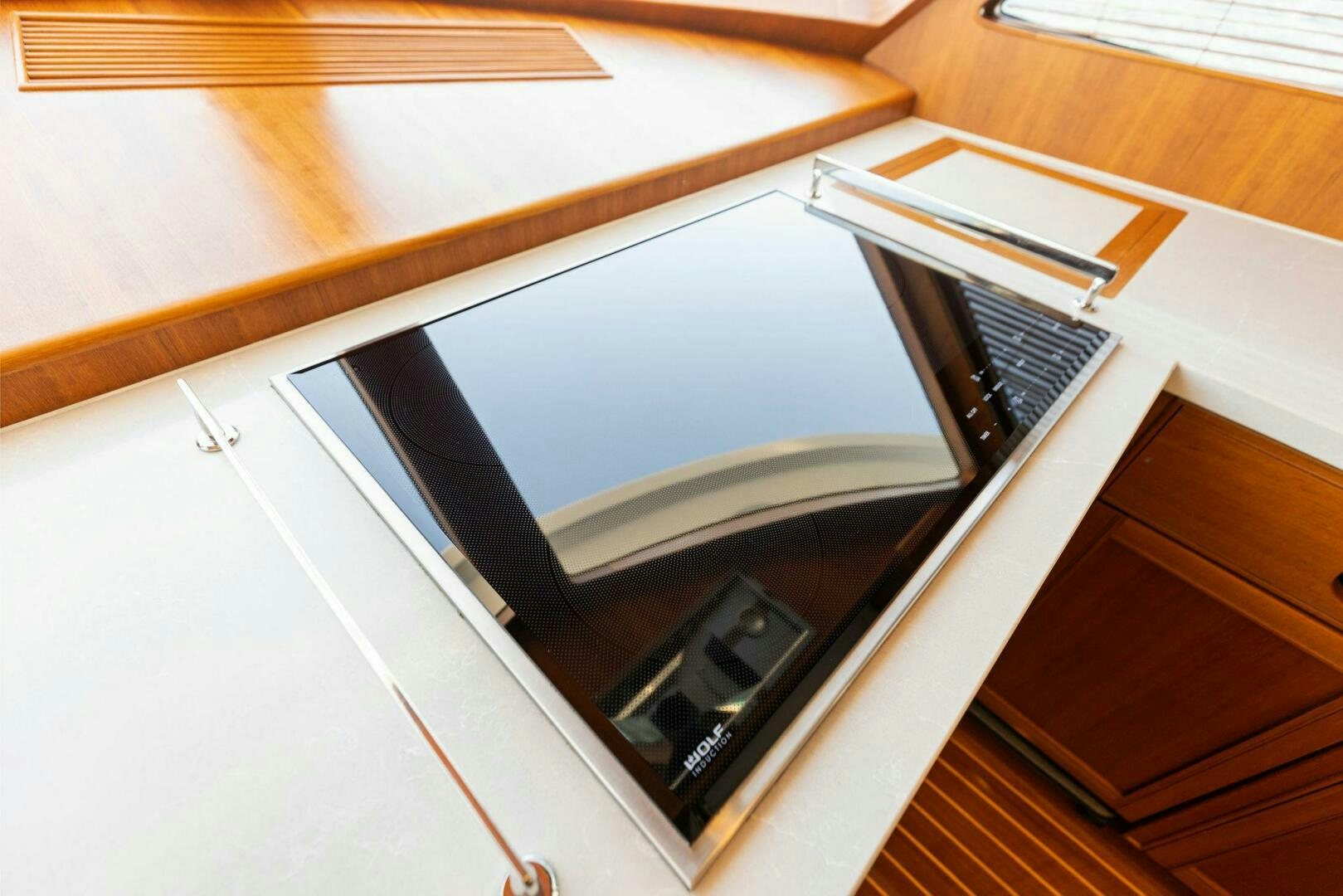 a black microwave oven aboard SUNZSET Yacht for Sale
