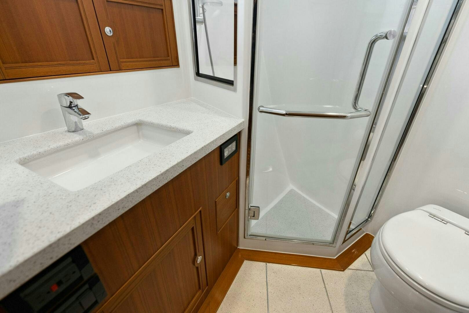 a bathroom with a sink and a toilet aboard SUNZSET Yacht for Sale
