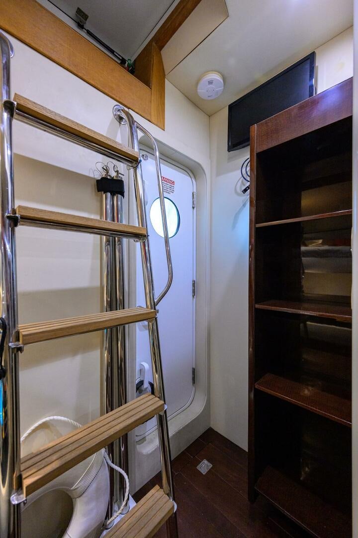 a bathroom with a mirror and a sink aboard VIXEN Yacht for Sale