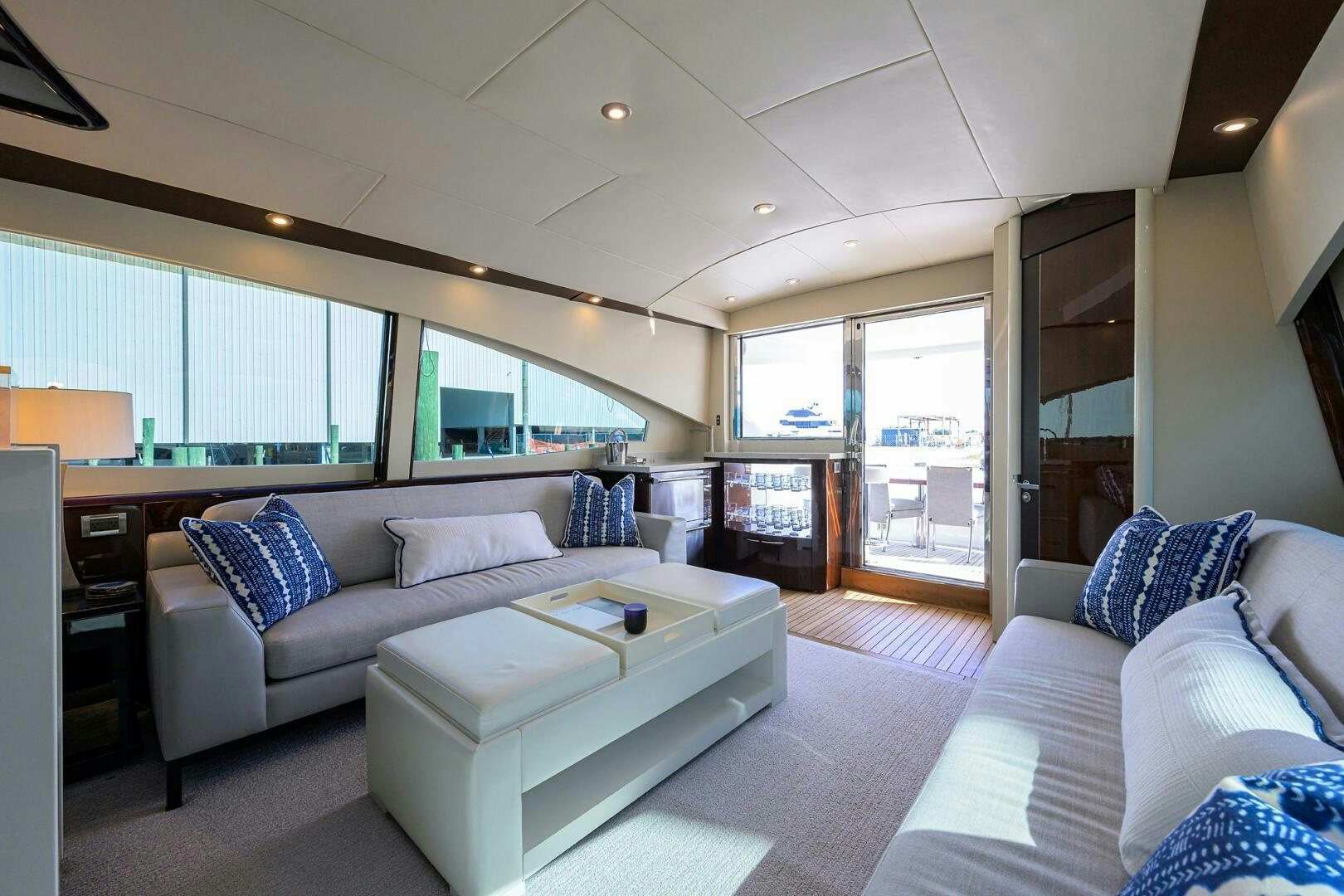 a living room with a couch and a table aboard VIXEN Yacht for Sale