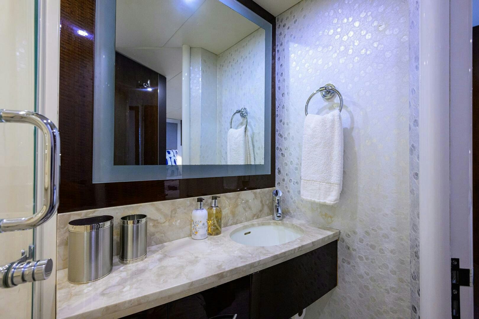 a bathroom with a large mirror aboard VIXEN Yacht for Sale