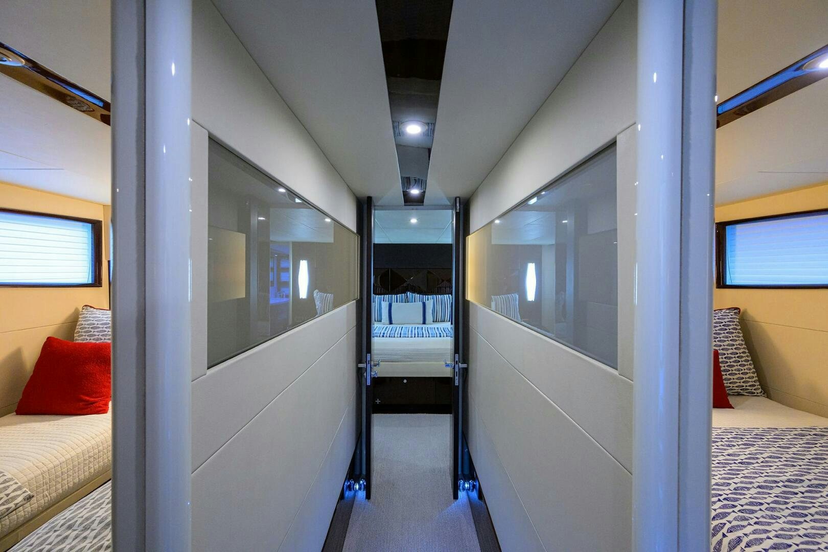 a room with a bed and a couch aboard VIXEN Yacht for Sale