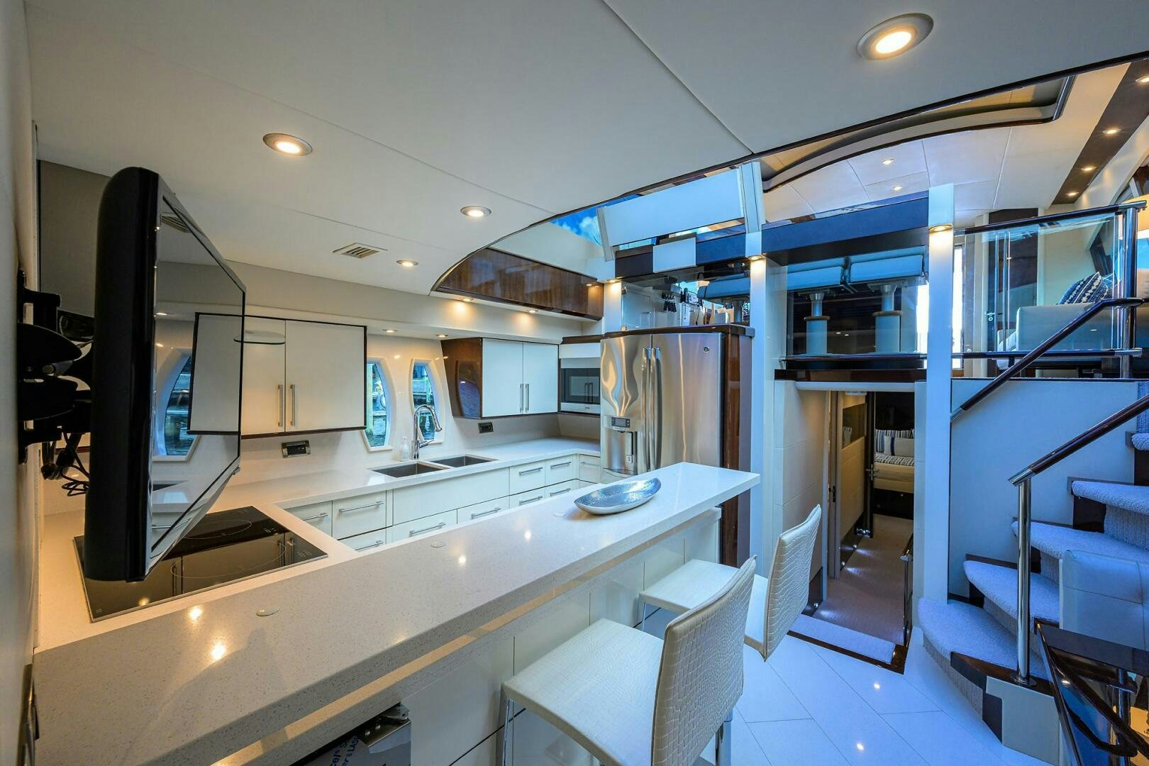 a kitchen with a large island aboard VIXEN Yacht for Sale