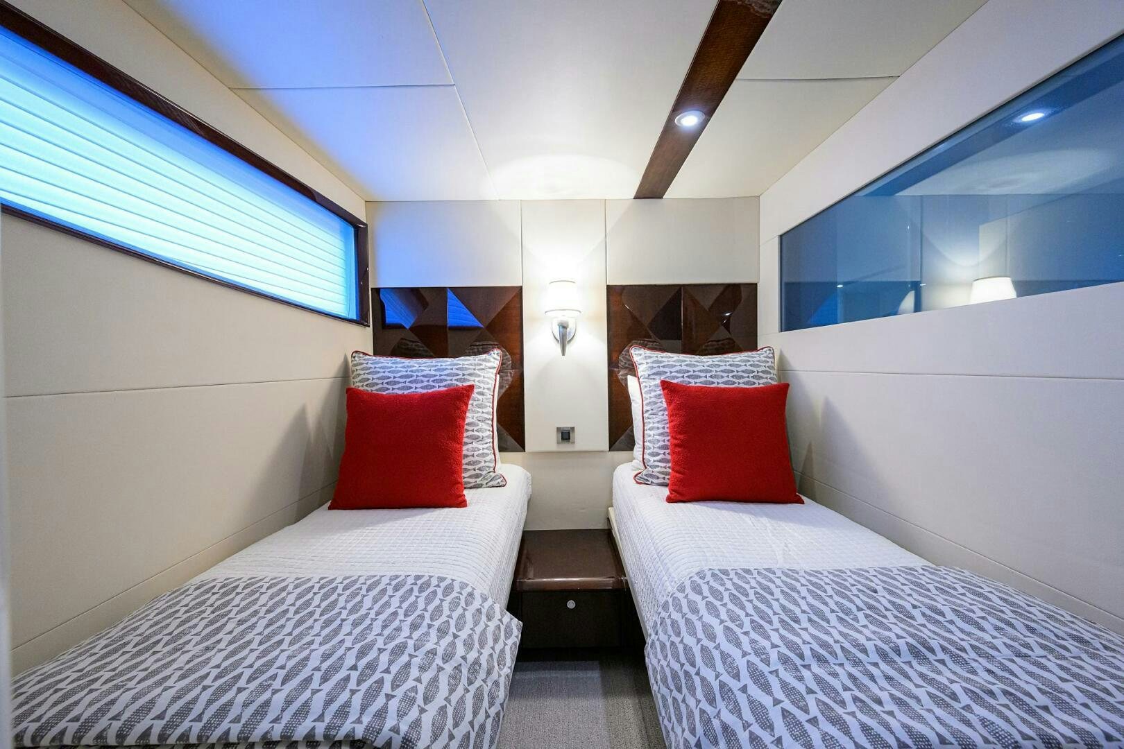 a room with two beds aboard VIXEN Yacht for Sale
