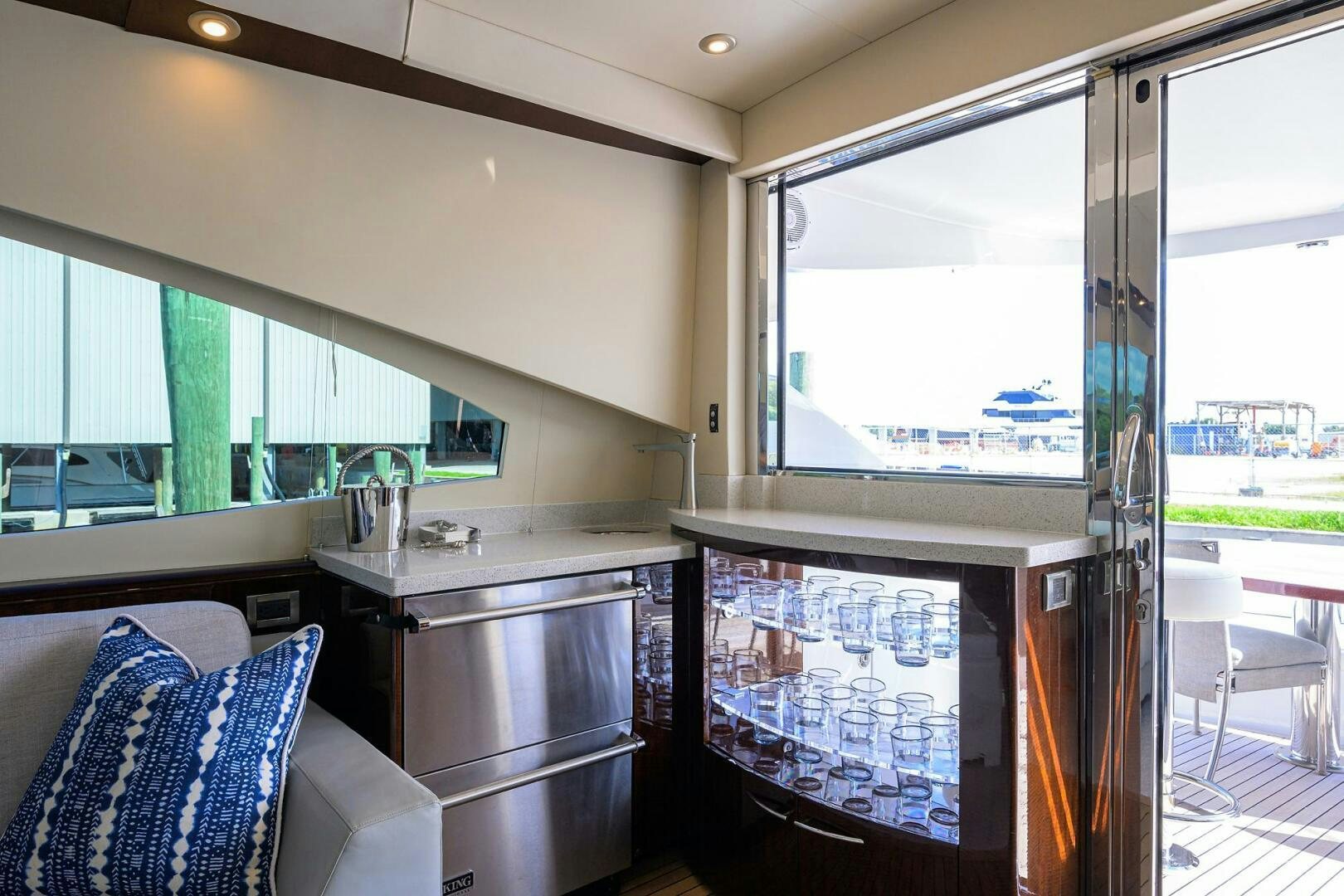 a kitchen with a glass door aboard VIXEN Yacht for Sale