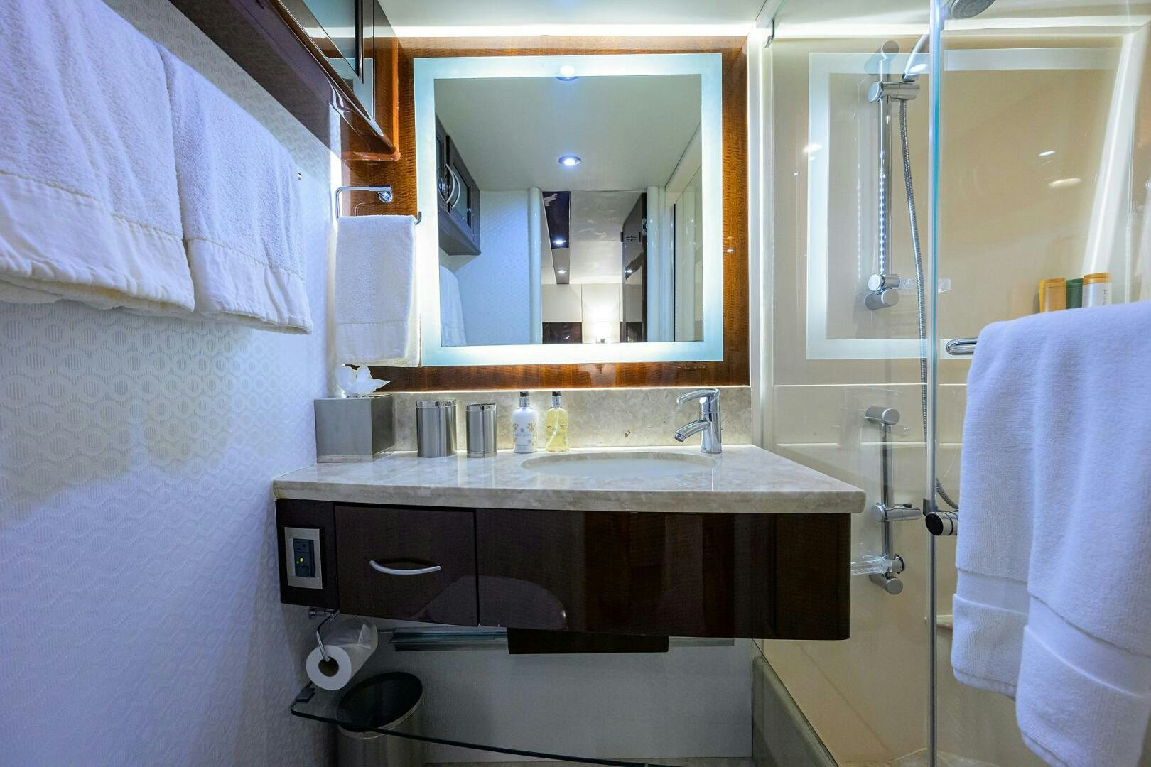 a bathroom with a sink and mirror aboard VIXEN Yacht for Sale