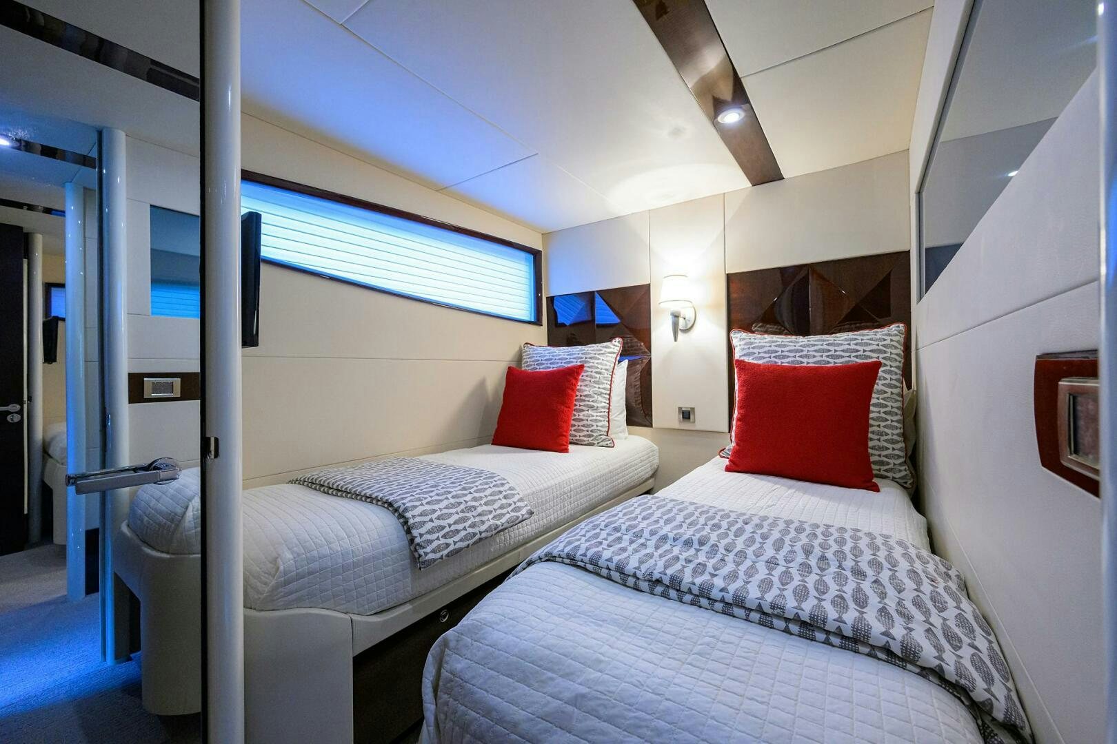 a room with two beds aboard VIXEN Yacht for Sale