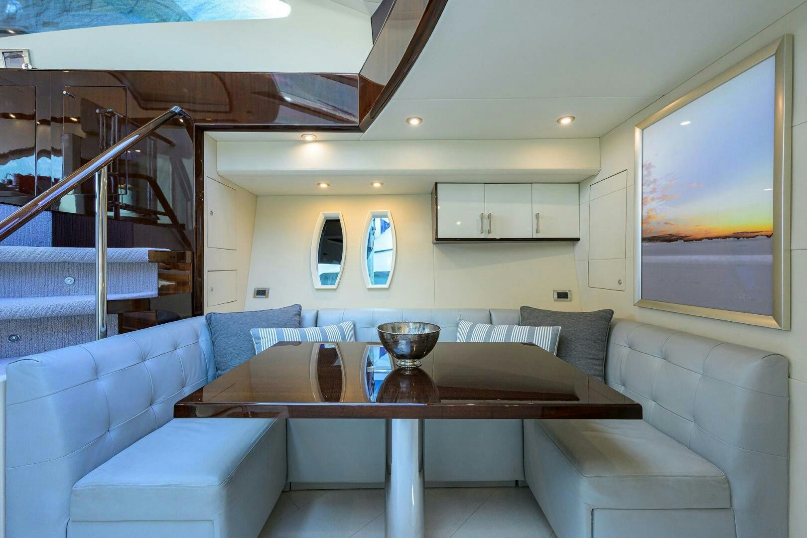 a living room with a couch and a coffee table aboard VIXEN Yacht for Sale