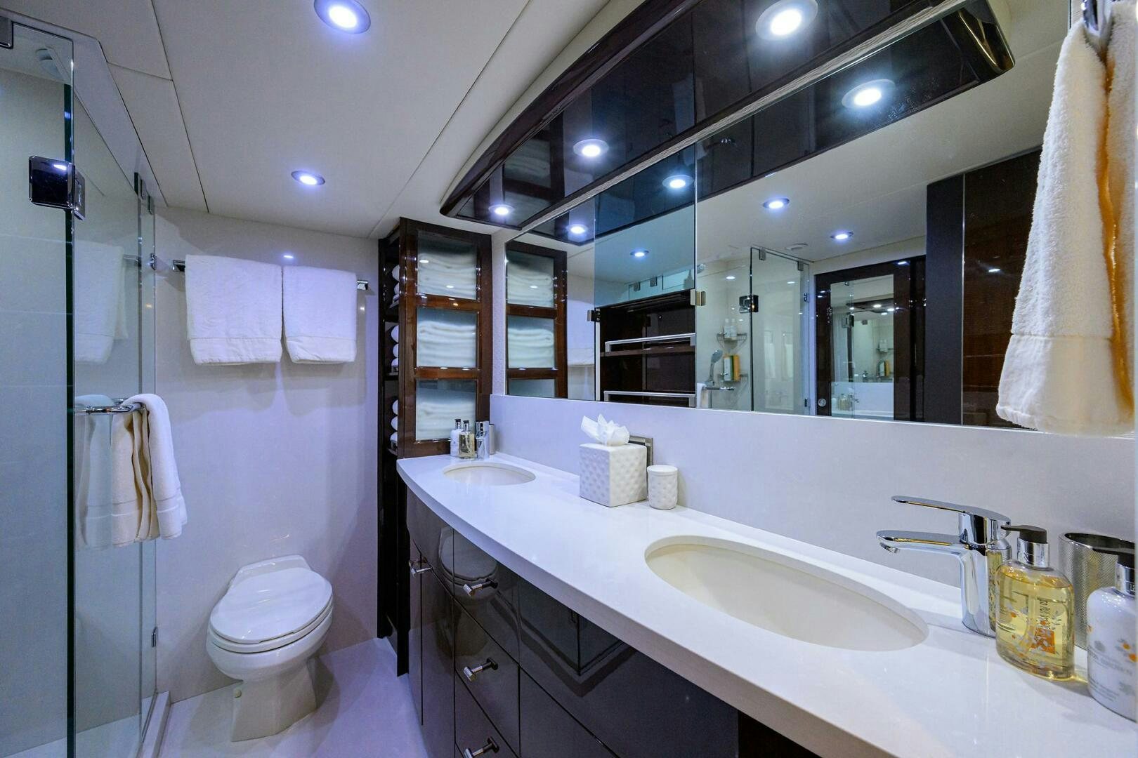 a bathroom with a sink and a toilet aboard VIXEN Yacht for Sale