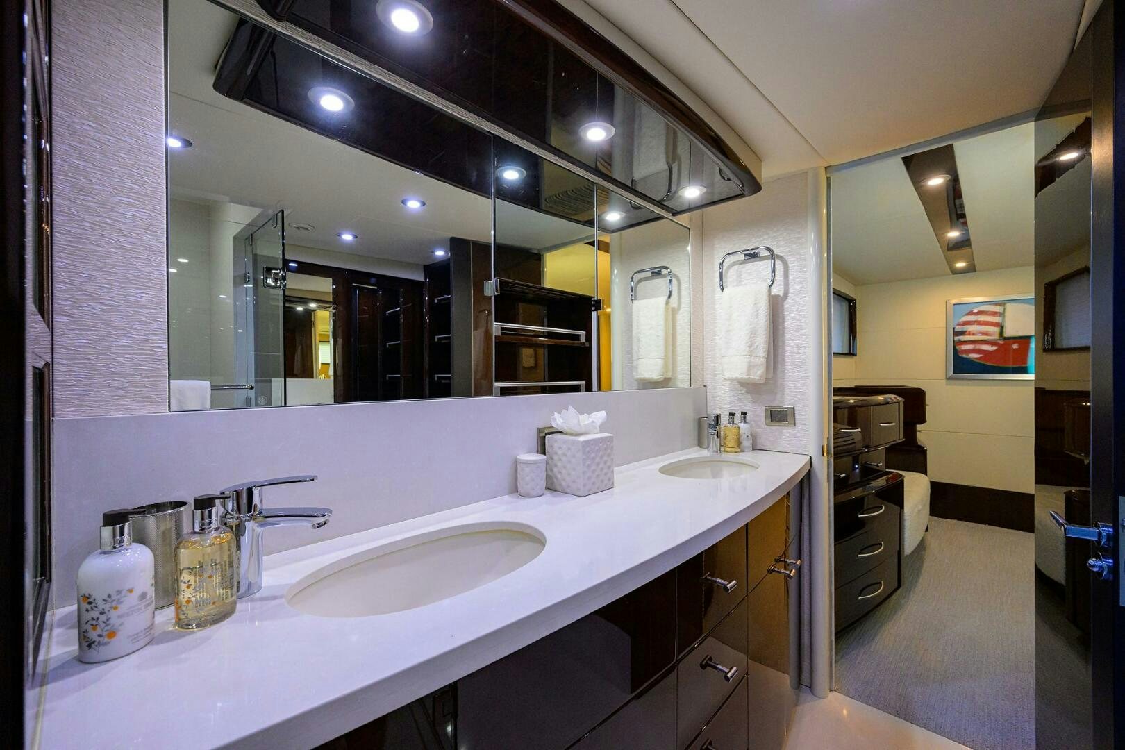 a bathroom with a large mirror aboard VIXEN Yacht for Sale