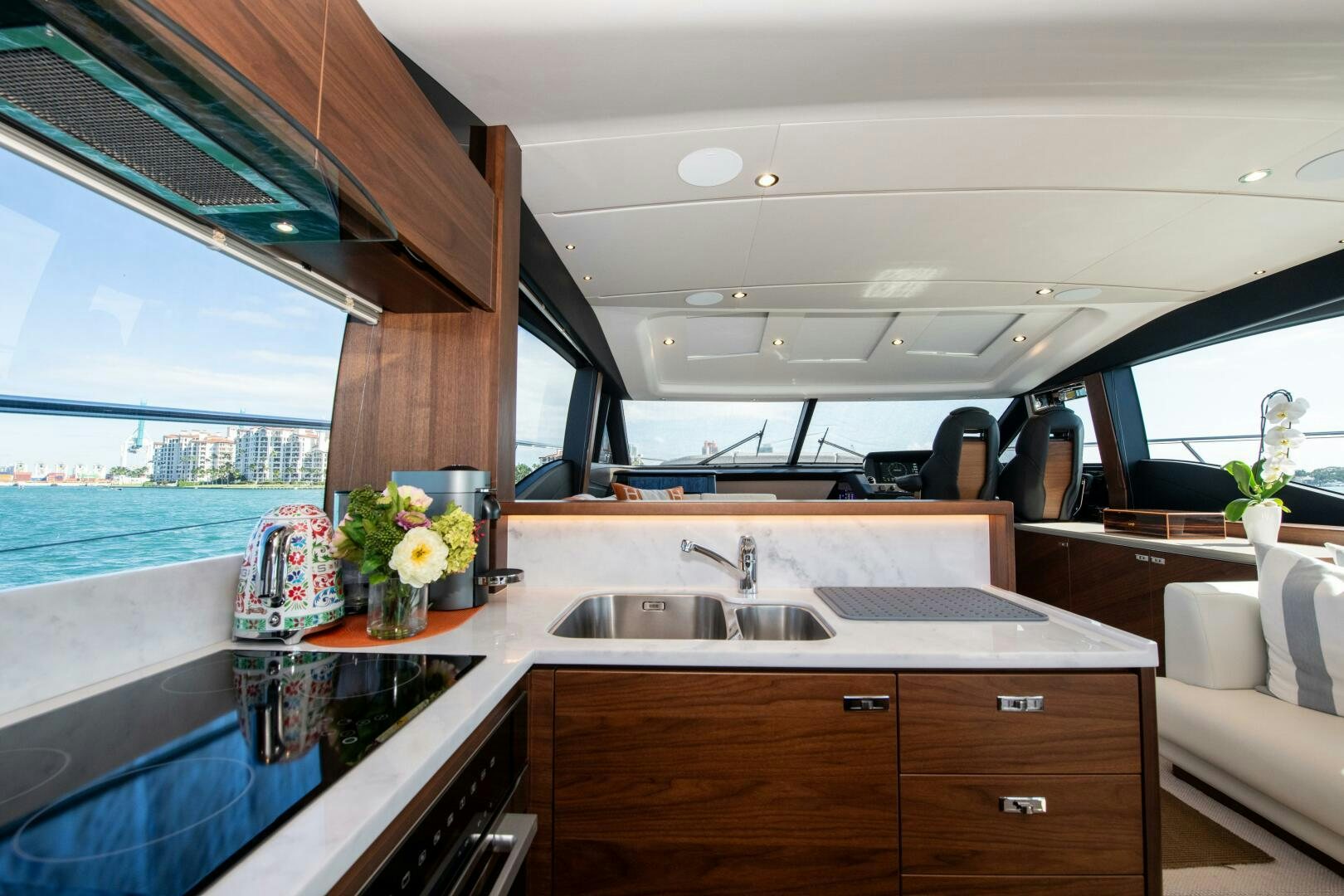 a kitchen with a large window aboard LADY D Yacht for Sale