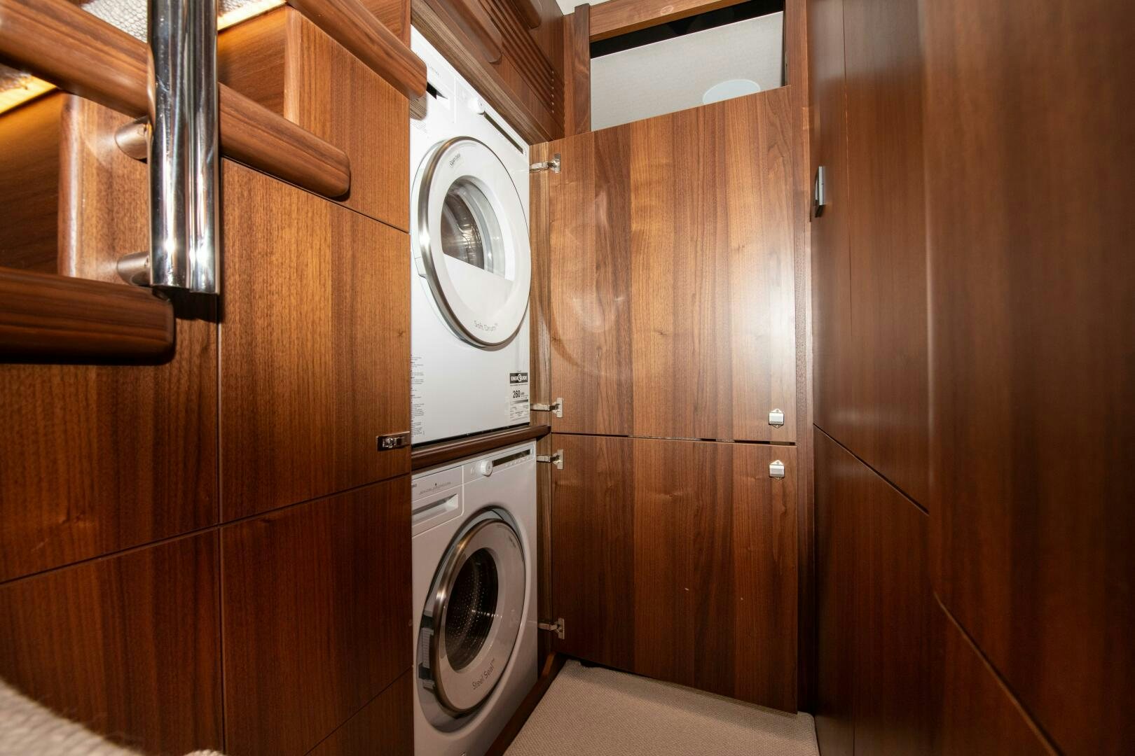 a room with a washing machine aboard LADY D Yacht for Sale
