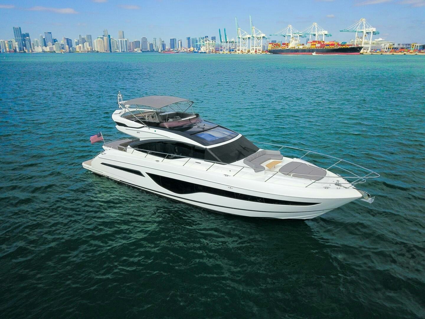 a white boat on the water aboard LADY D Yacht for Sale