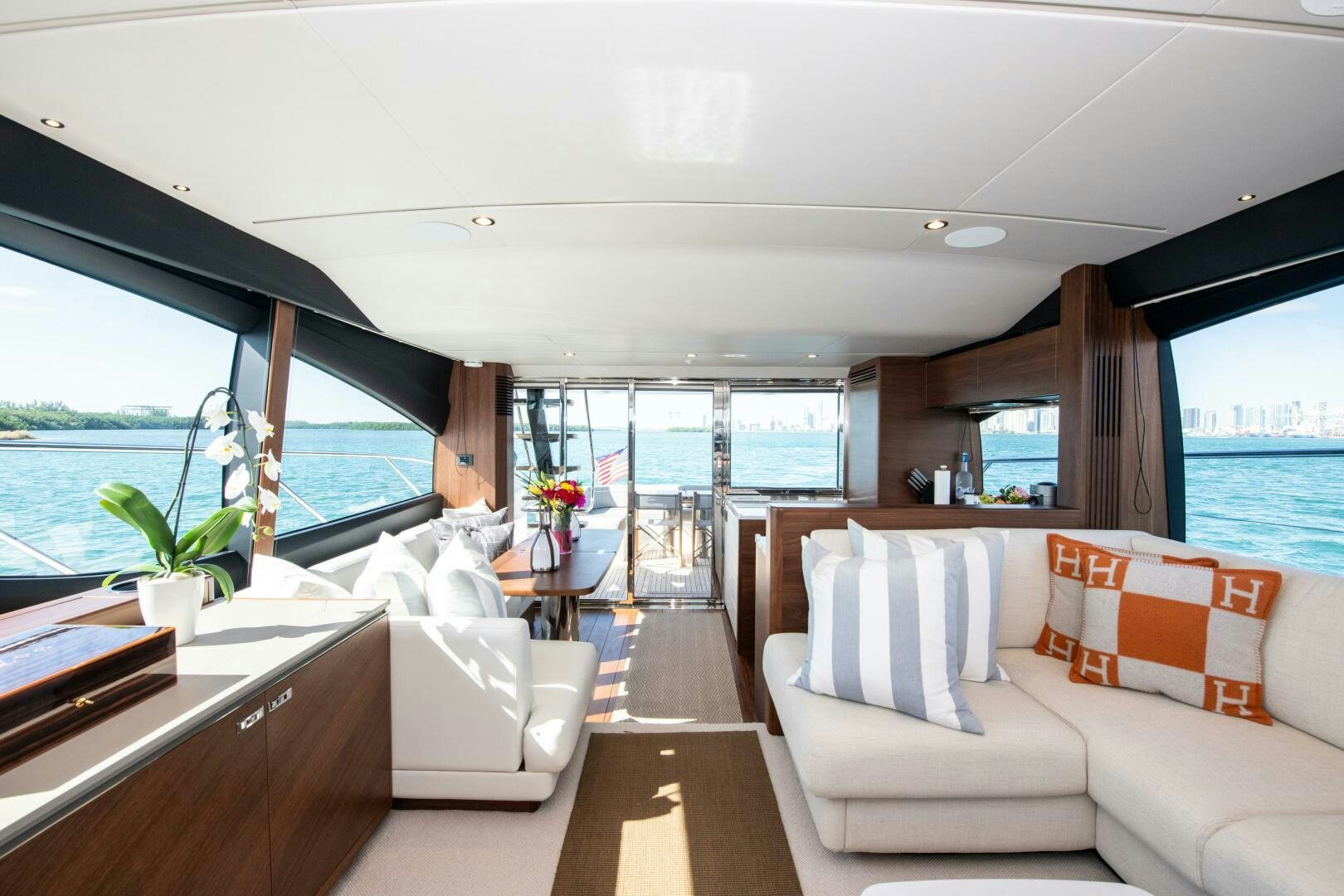 a living room with a large window aboard LADY D Yacht for Sale