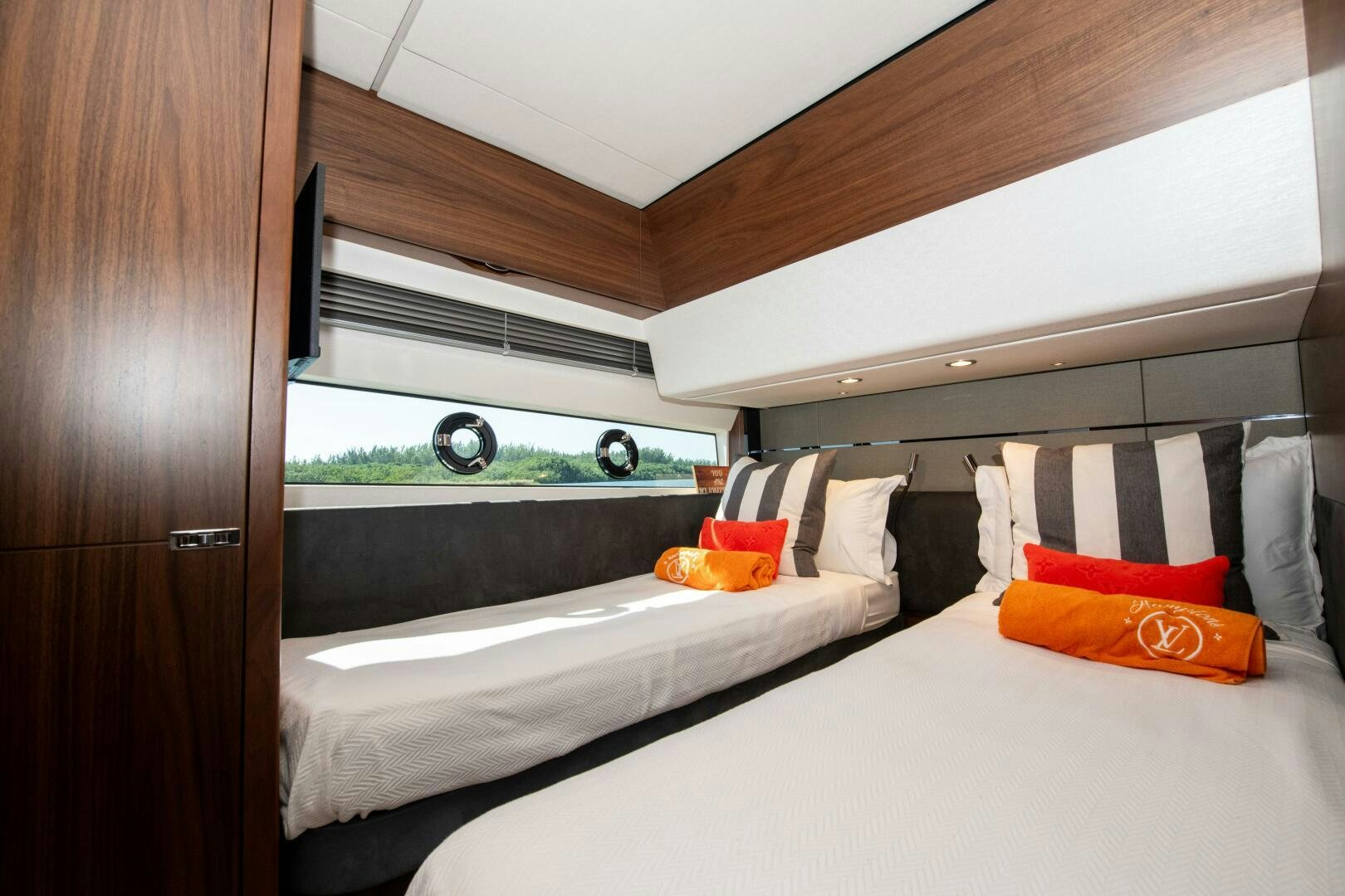 a room with two beds aboard LADY D Yacht for Sale