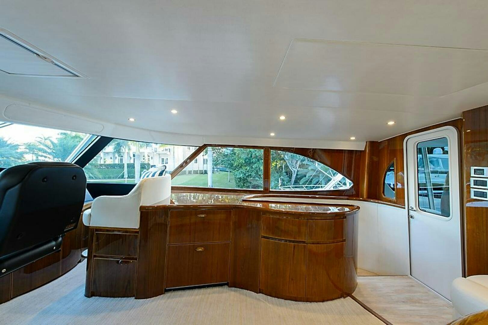 a room with a couch and a television aboard ASASKA Yacht for Sale