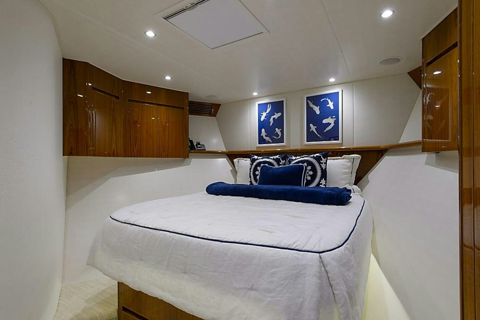 a bed in a room aboard ASASKA Yacht for Sale