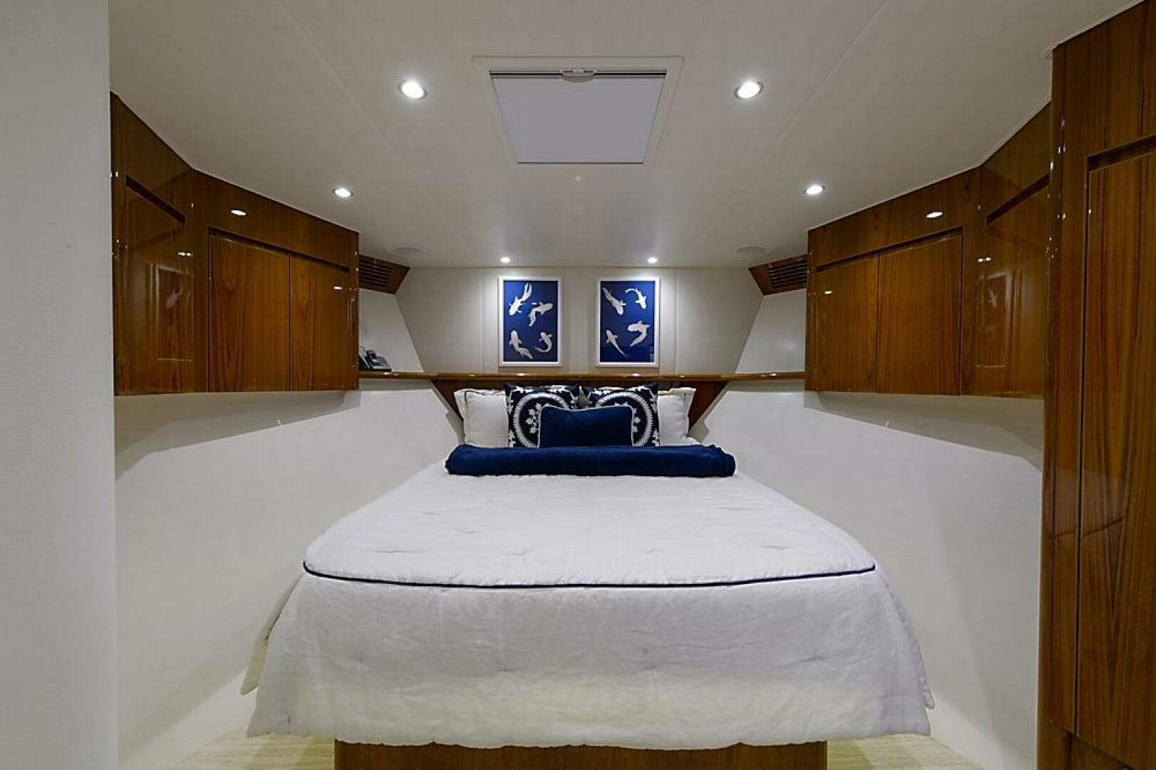 a bed in a room aboard ASASKA Yacht for Sale