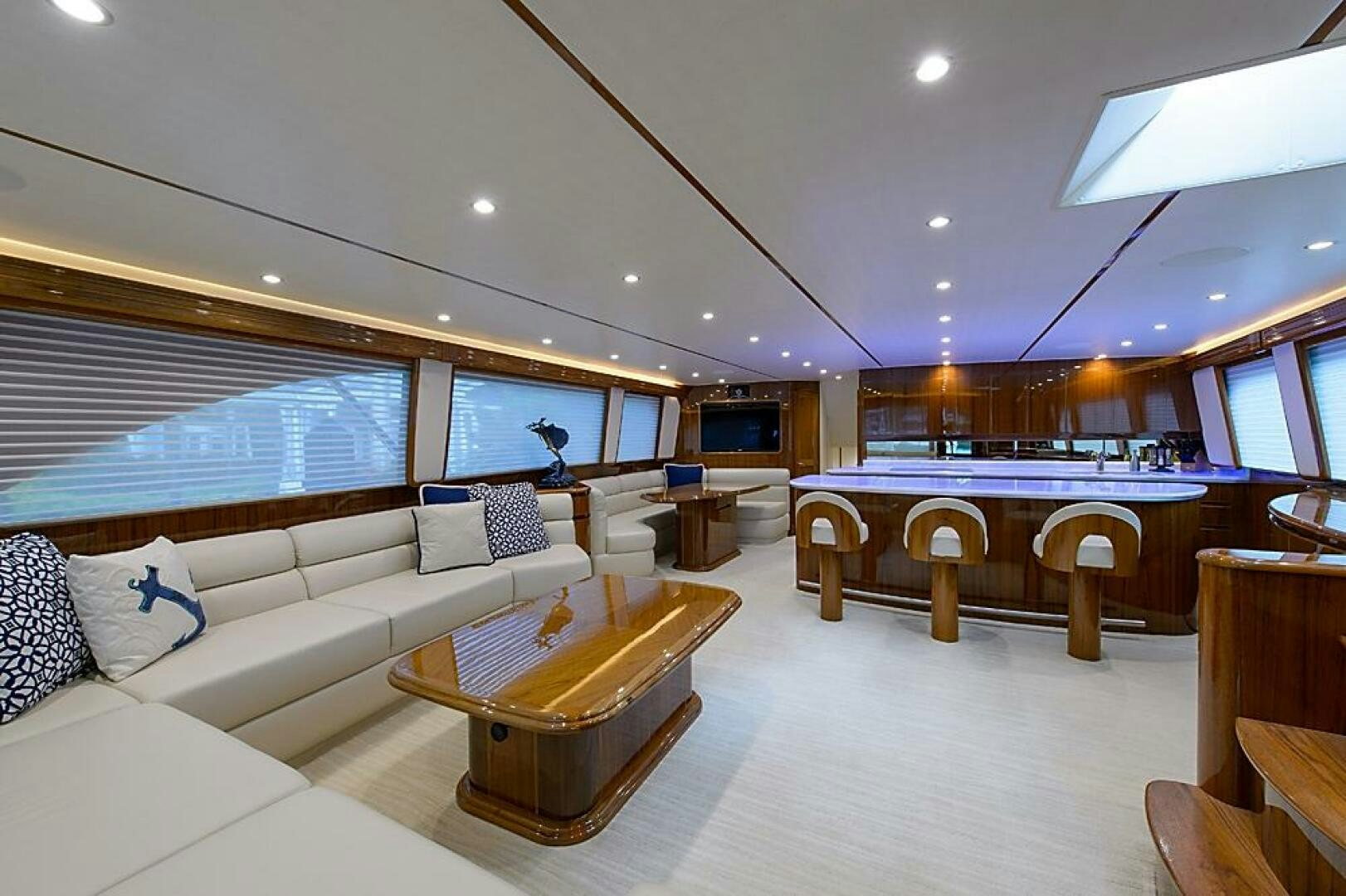 a large living room with a large window aboard ASASKA Yacht for Sale