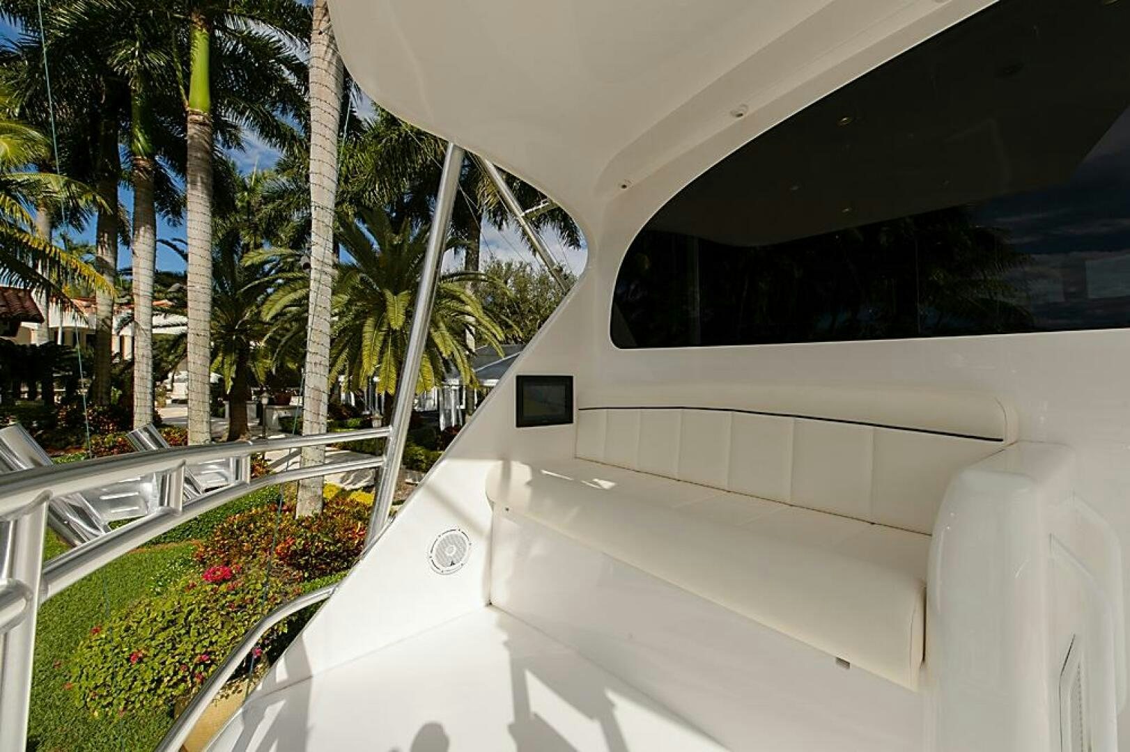 a white car parked in a parking lot aboard ASASKA Yacht for Sale
