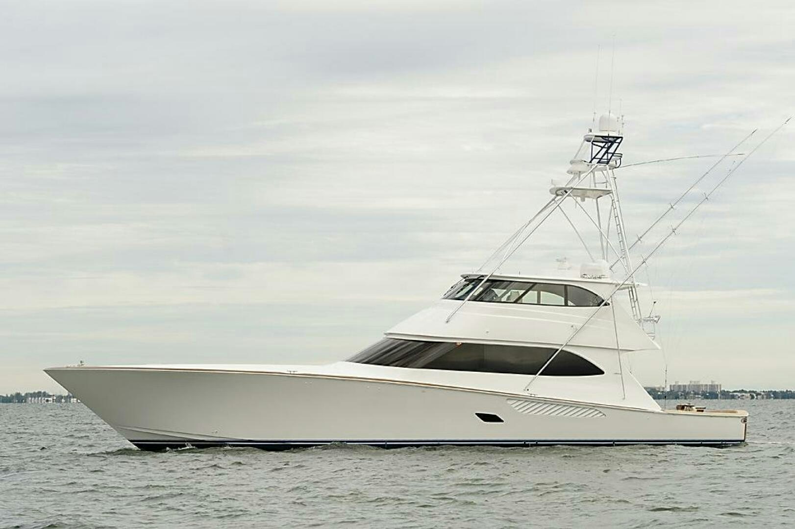 a white yacht on the water aboard ASASKA Yacht for Sale