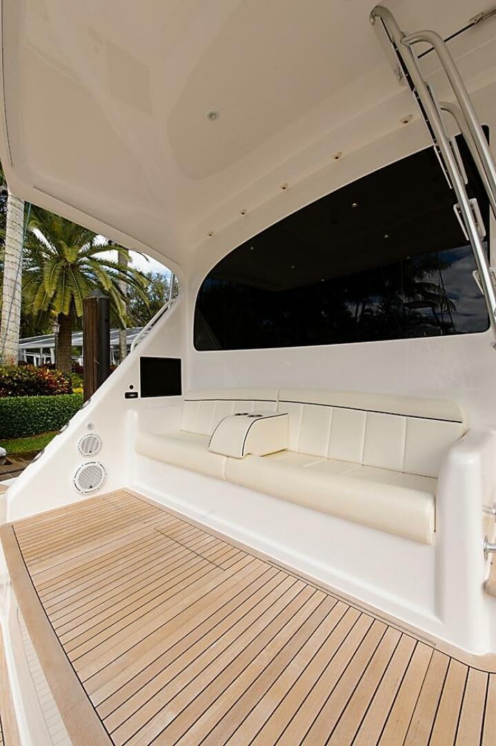 a white car with a flat screen aboard ASASKA Yacht for Sale