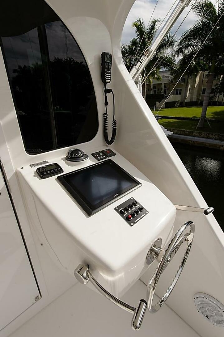 a white machine with a screen aboard ASASKA Yacht for Sale