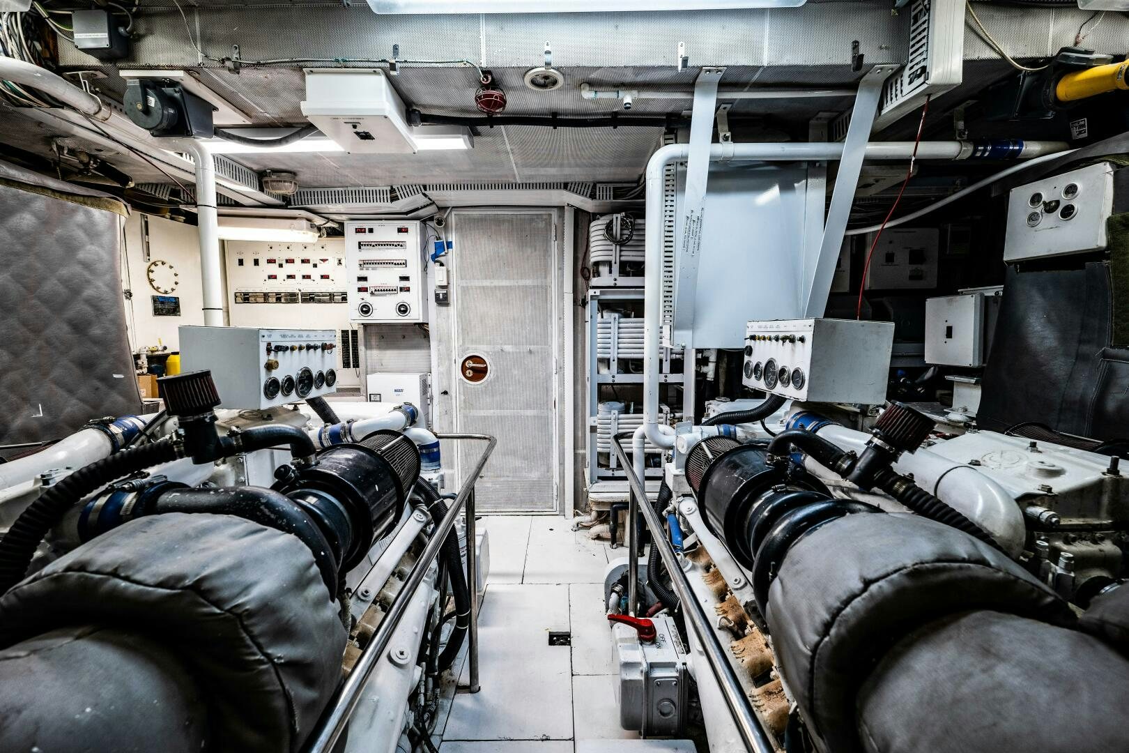 a room with several machines aboard TRILOGY Yacht for Sale