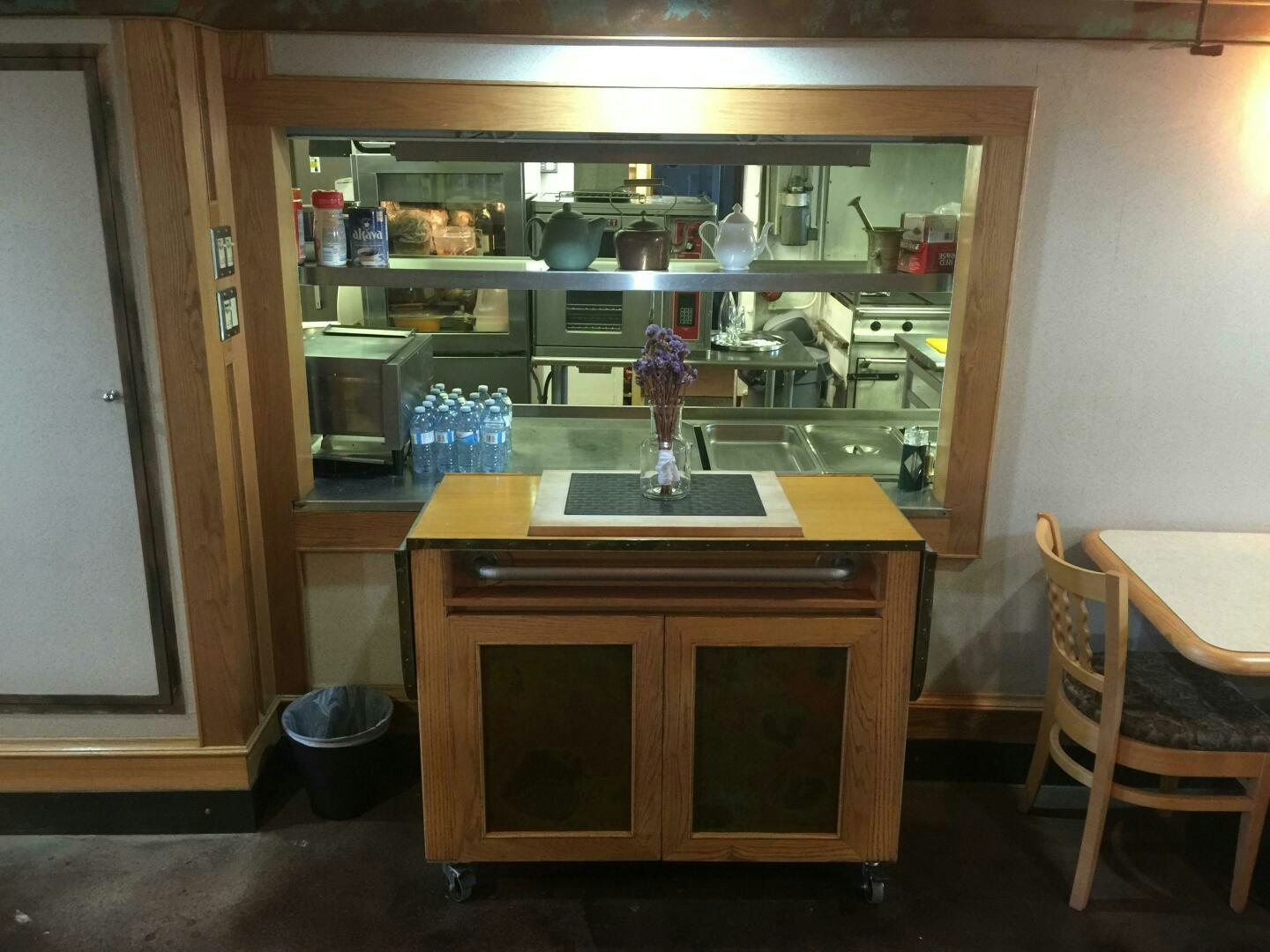 a glass cabinet with a shelf aboard SALTY Yacht for Sale