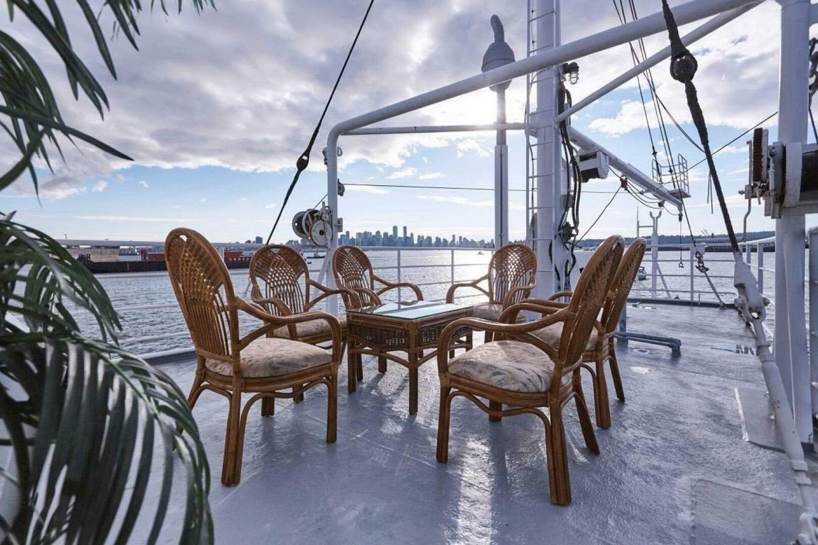 a group of chairs on a deck aboard SALTY Yacht for Sale