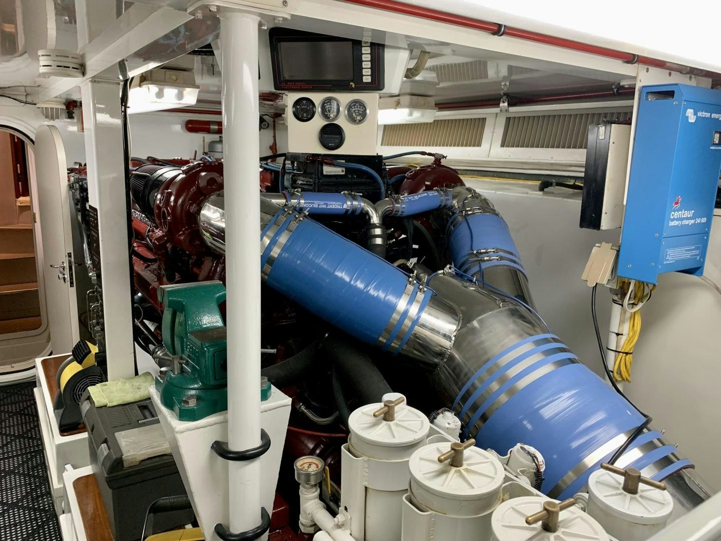 a machine with blue pipes aboard OBSESSION Yacht for Sale