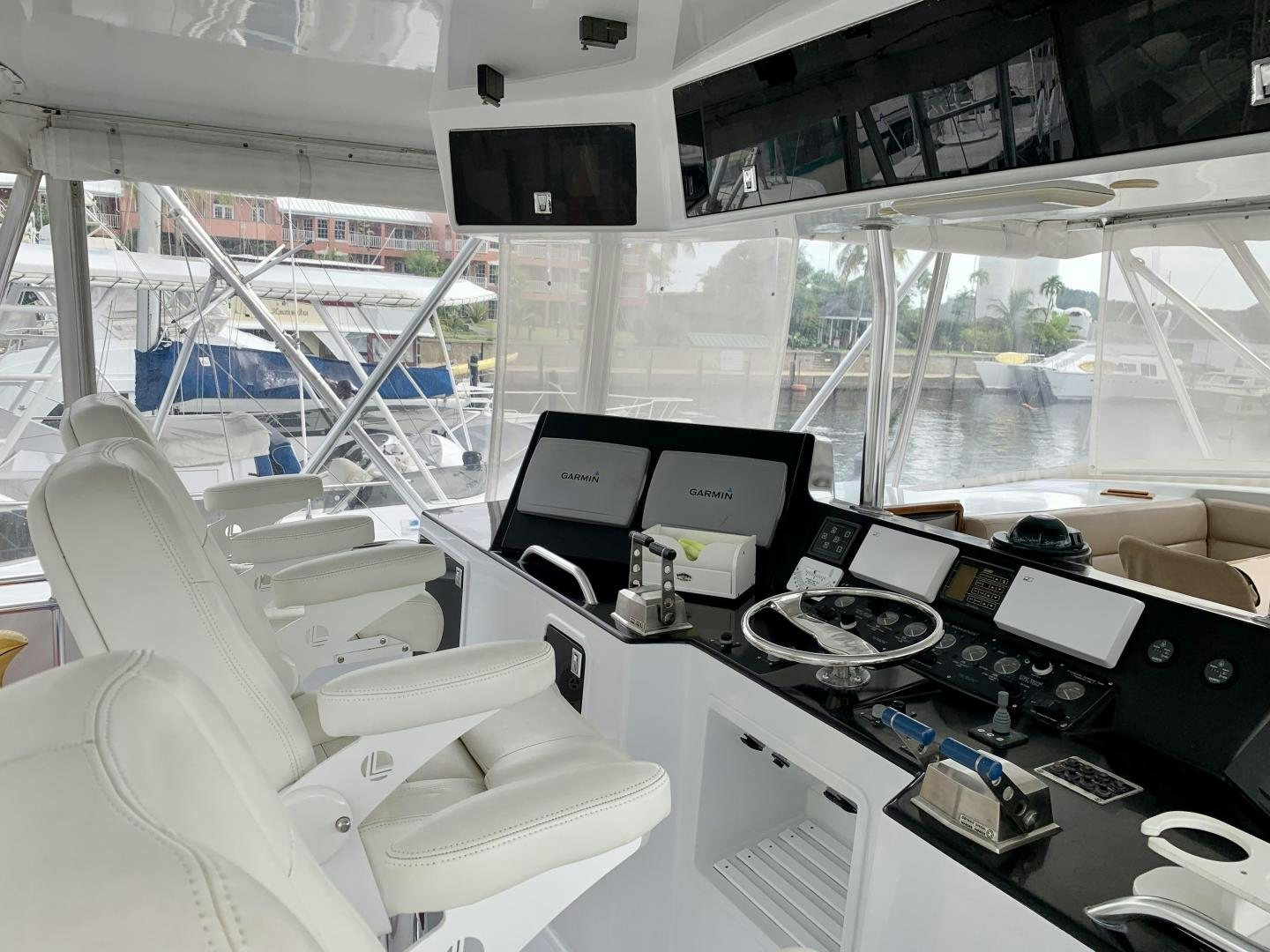 an airplane cockpit with many computers aboard OBSESSION Yacht for Sale