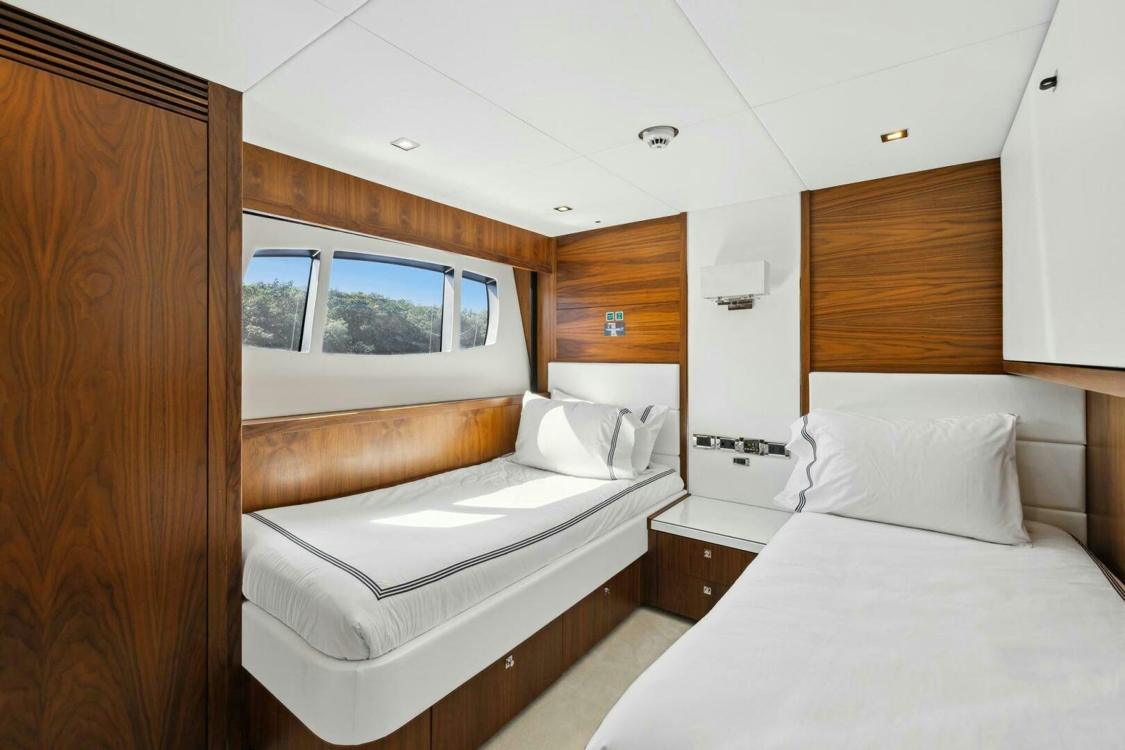 a room with two beds aboard SEAHORSE Yacht for Sale