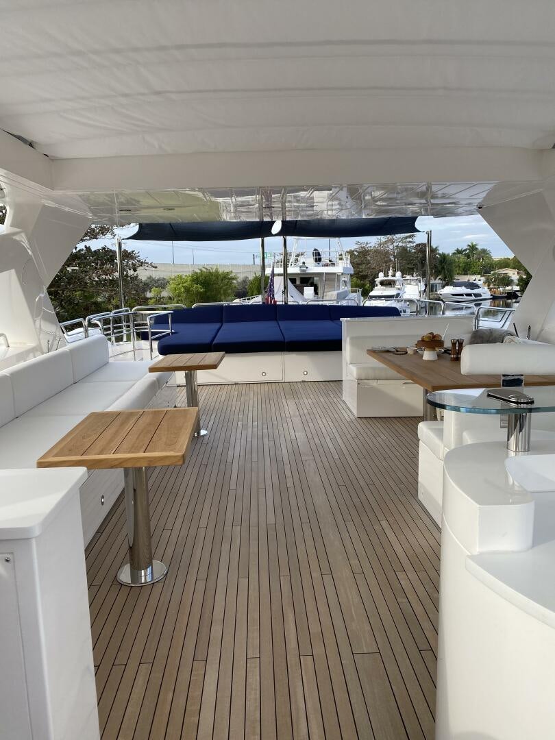 a room with a pool and a deck with a deck and a deck aboard SEAHORSE Yacht for Sale