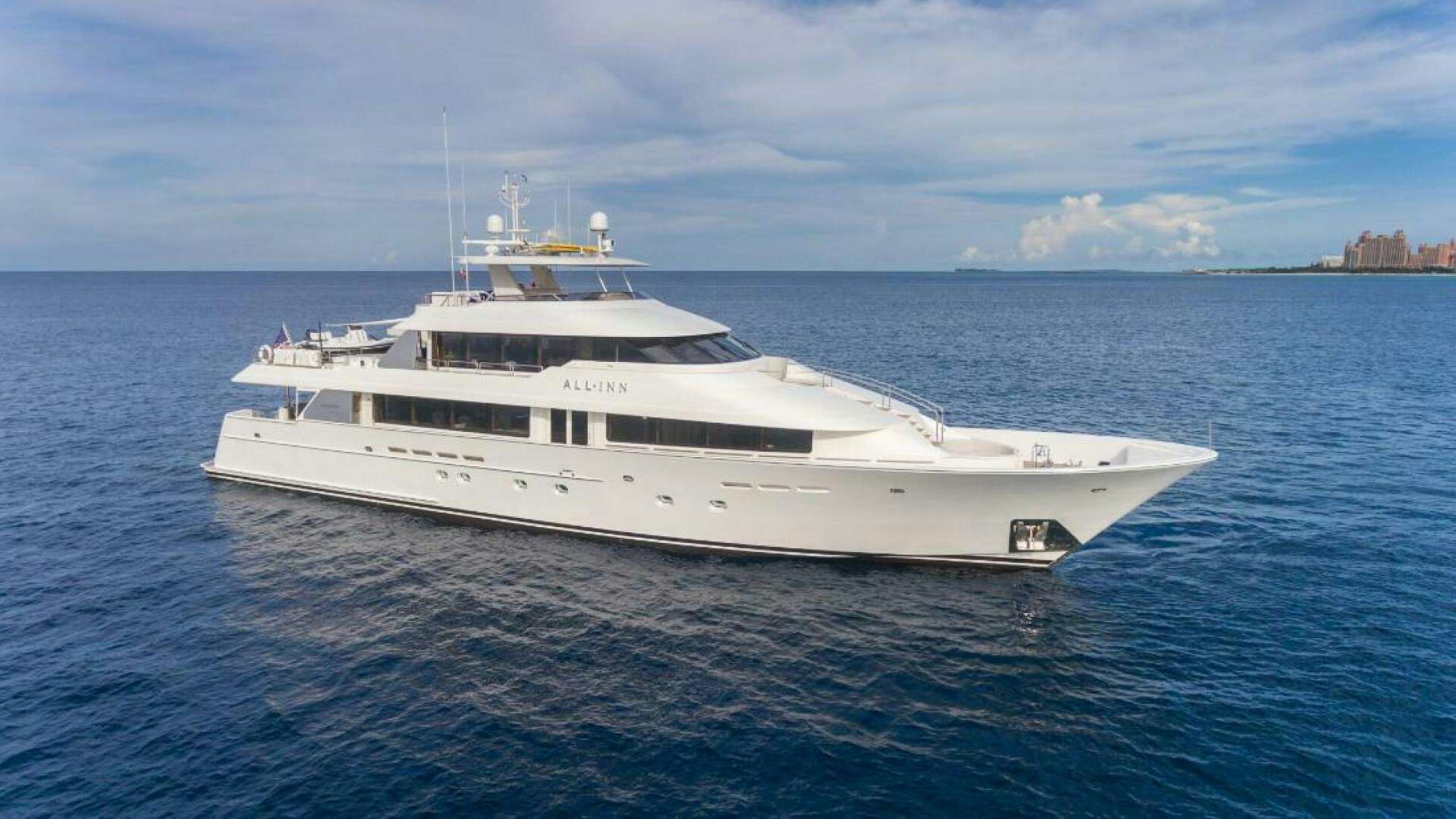 a white yacht in the water aboard ALL INN Yacht for Sale