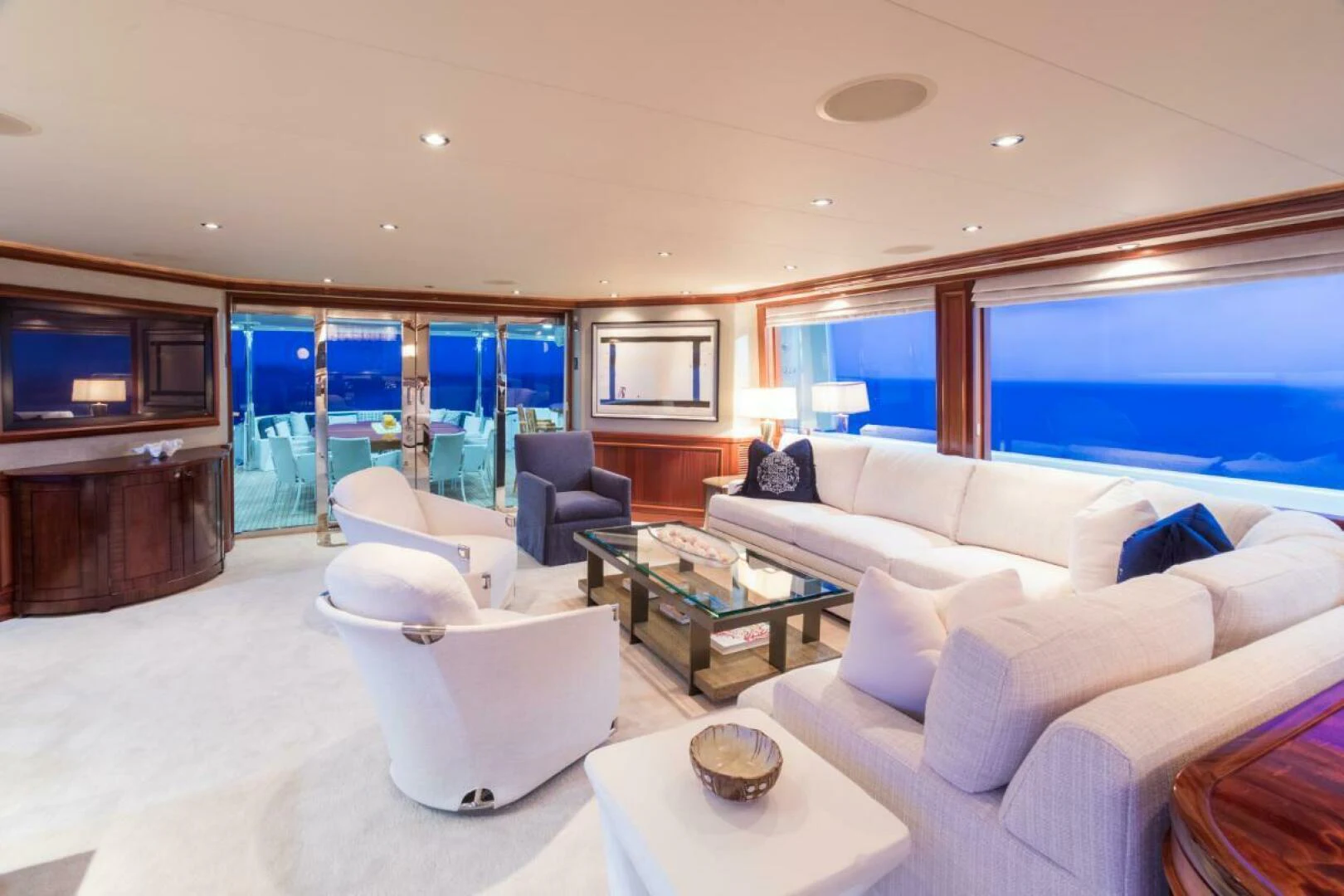 a living room with a large window aboard ALL INN Yacht for Sale