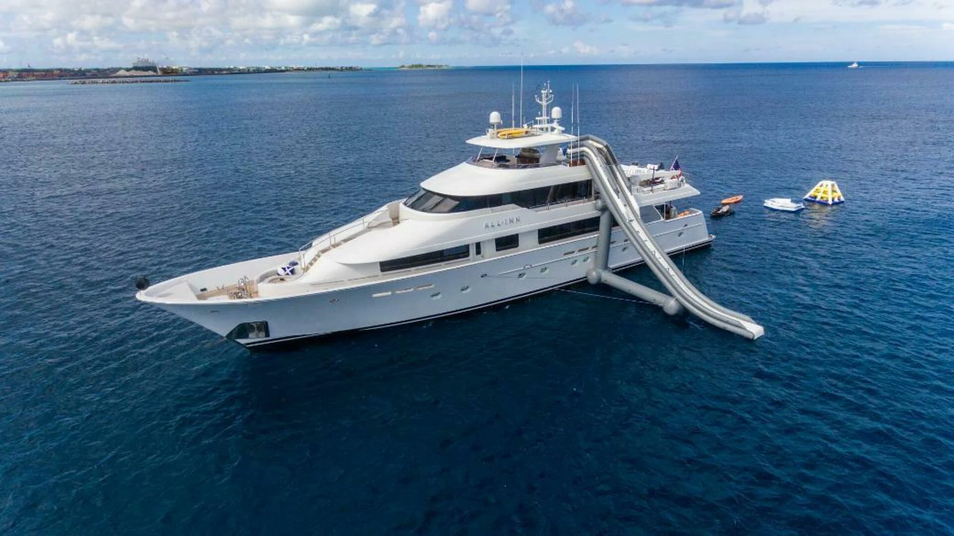 a white yacht in the water aboard ALL INN Yacht for Sale