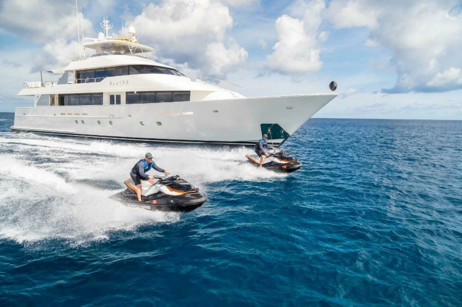 a boat and a boat in the water aboard ALL INN Yacht for Sale