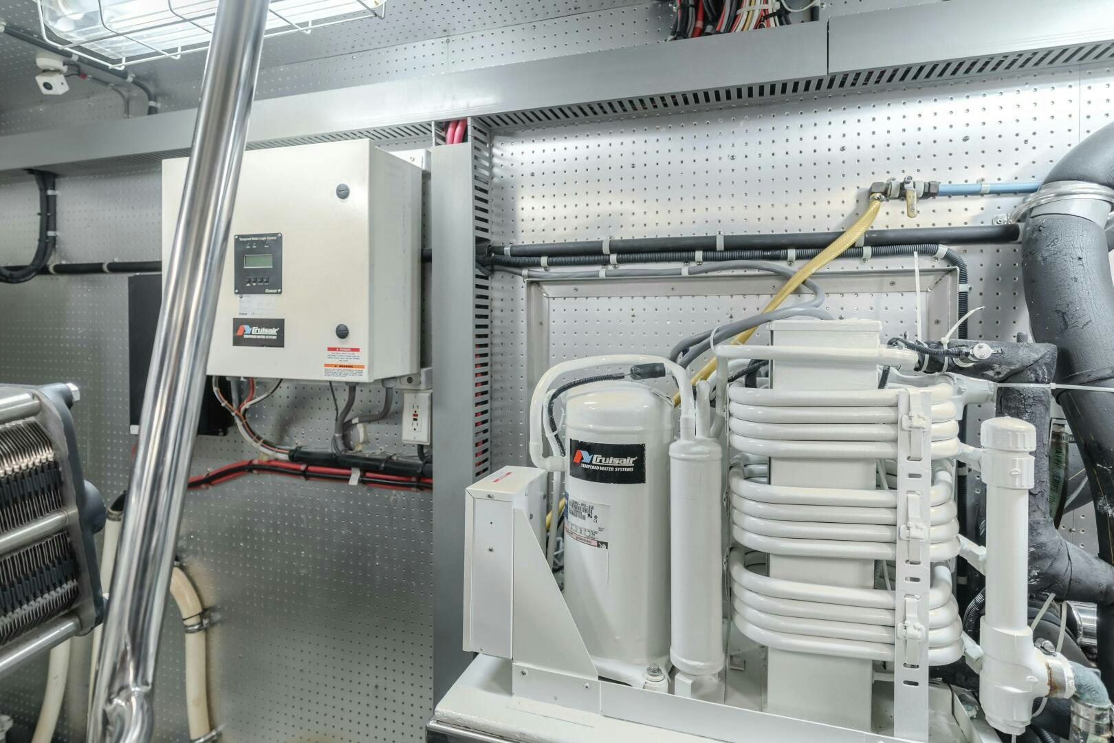 a machine with pipes aboard MONEY CAT Yacht for Sale