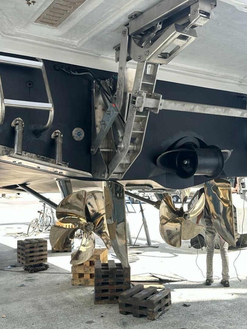 a person working on a machine aboard VISTA III Yacht for Sale