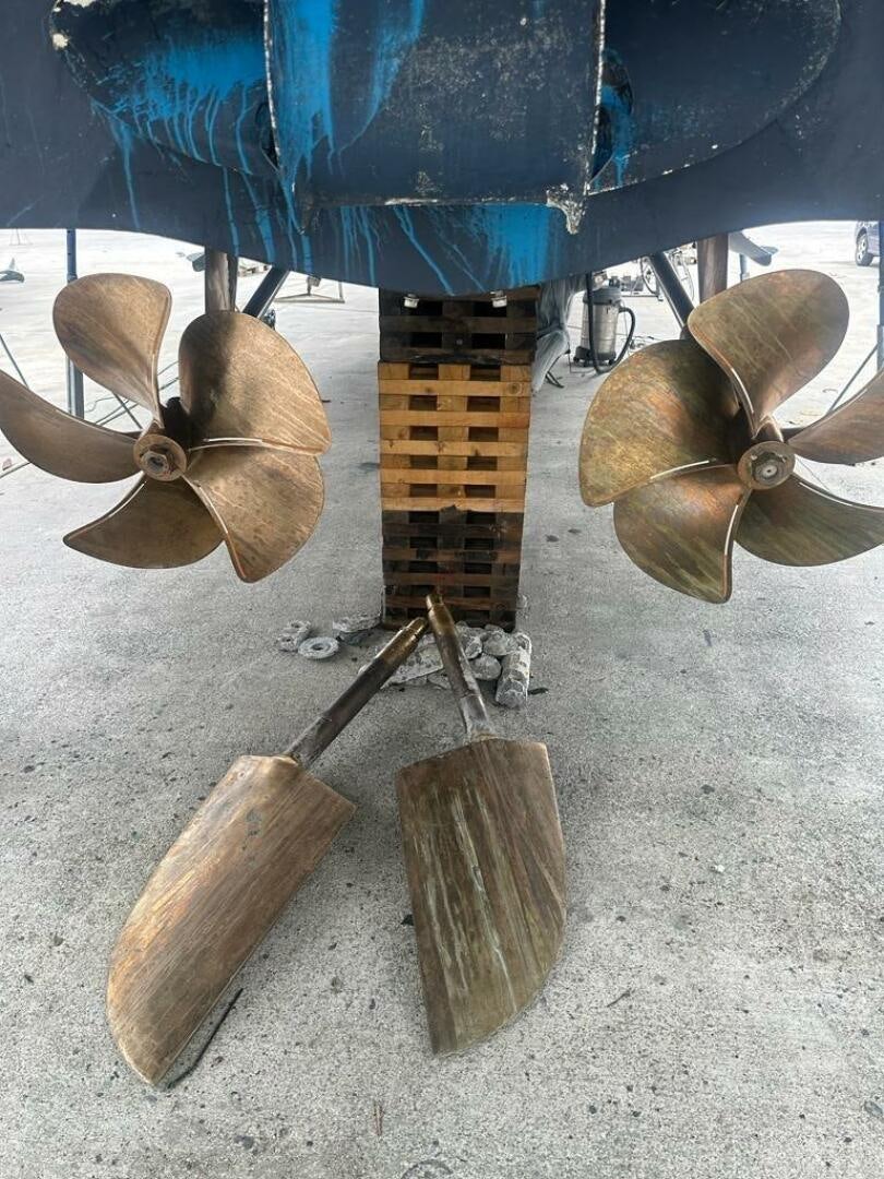 a wooden guitar leaning against a drum set aboard VISTA III Yacht for Sale